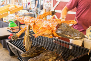 Whole alligator on the grill.